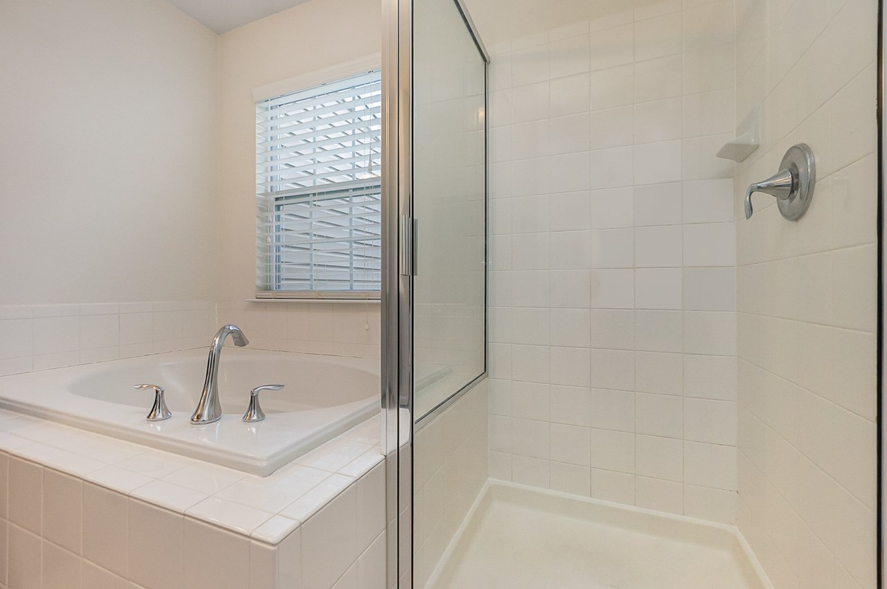 primary bathroom with soaking tub & shower