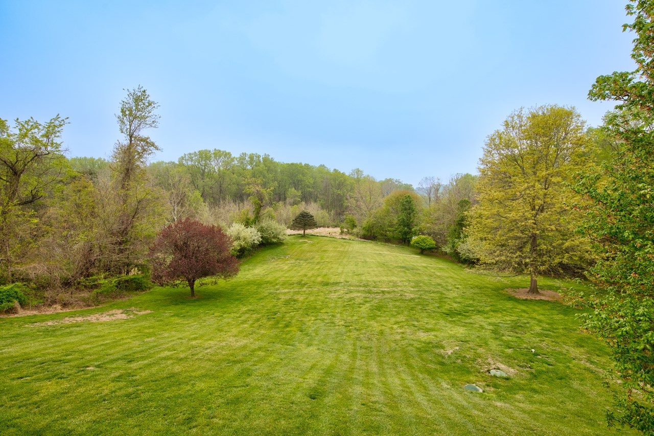 almost 1.5 acres of lush grounds