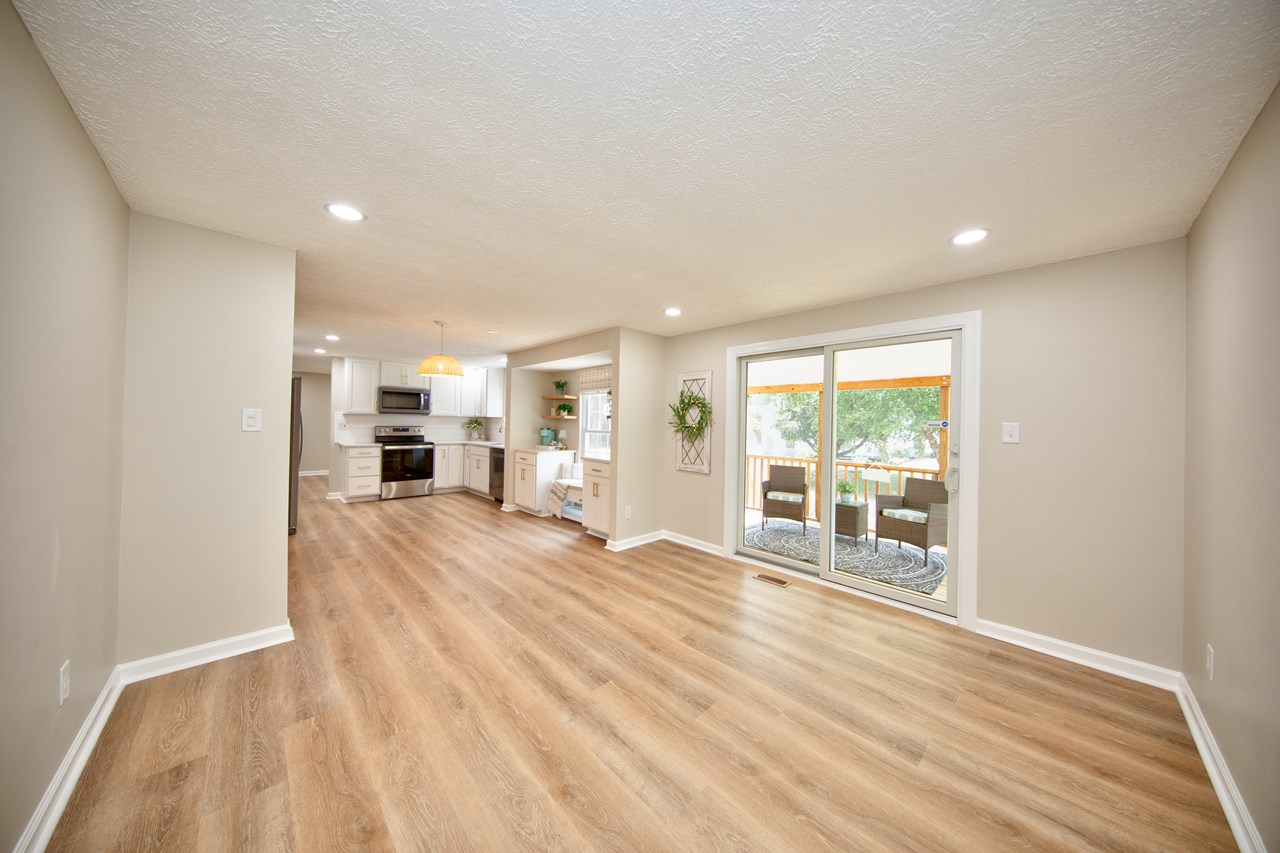 family room flows to kitchen & deck