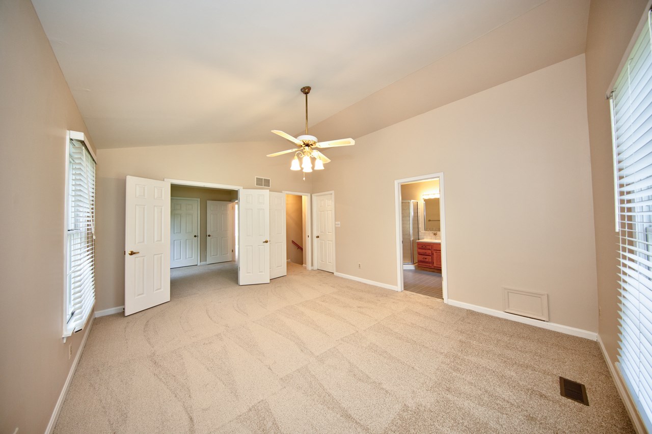 primary bedroom with new carpet & paint