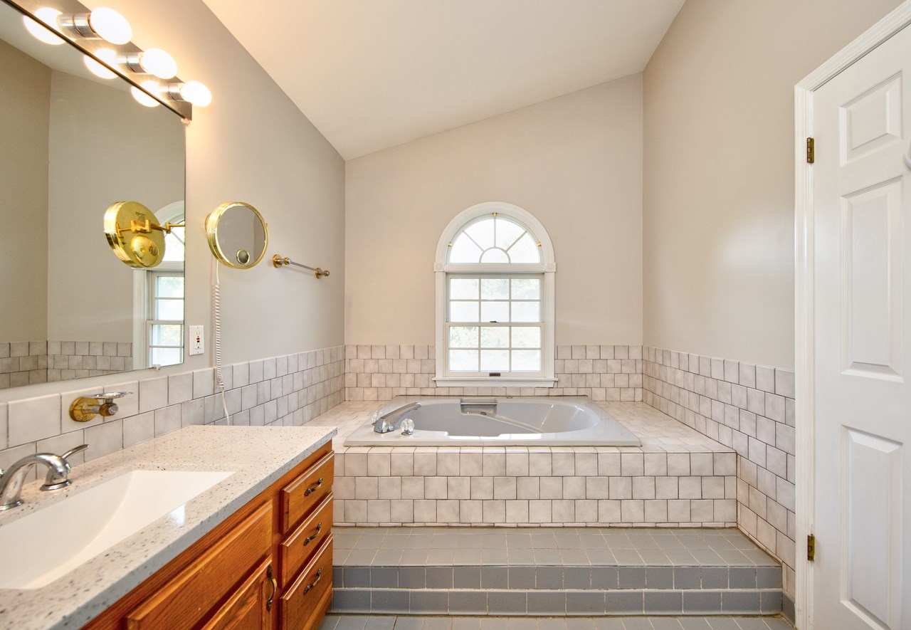 primary bathroom with soaking tub