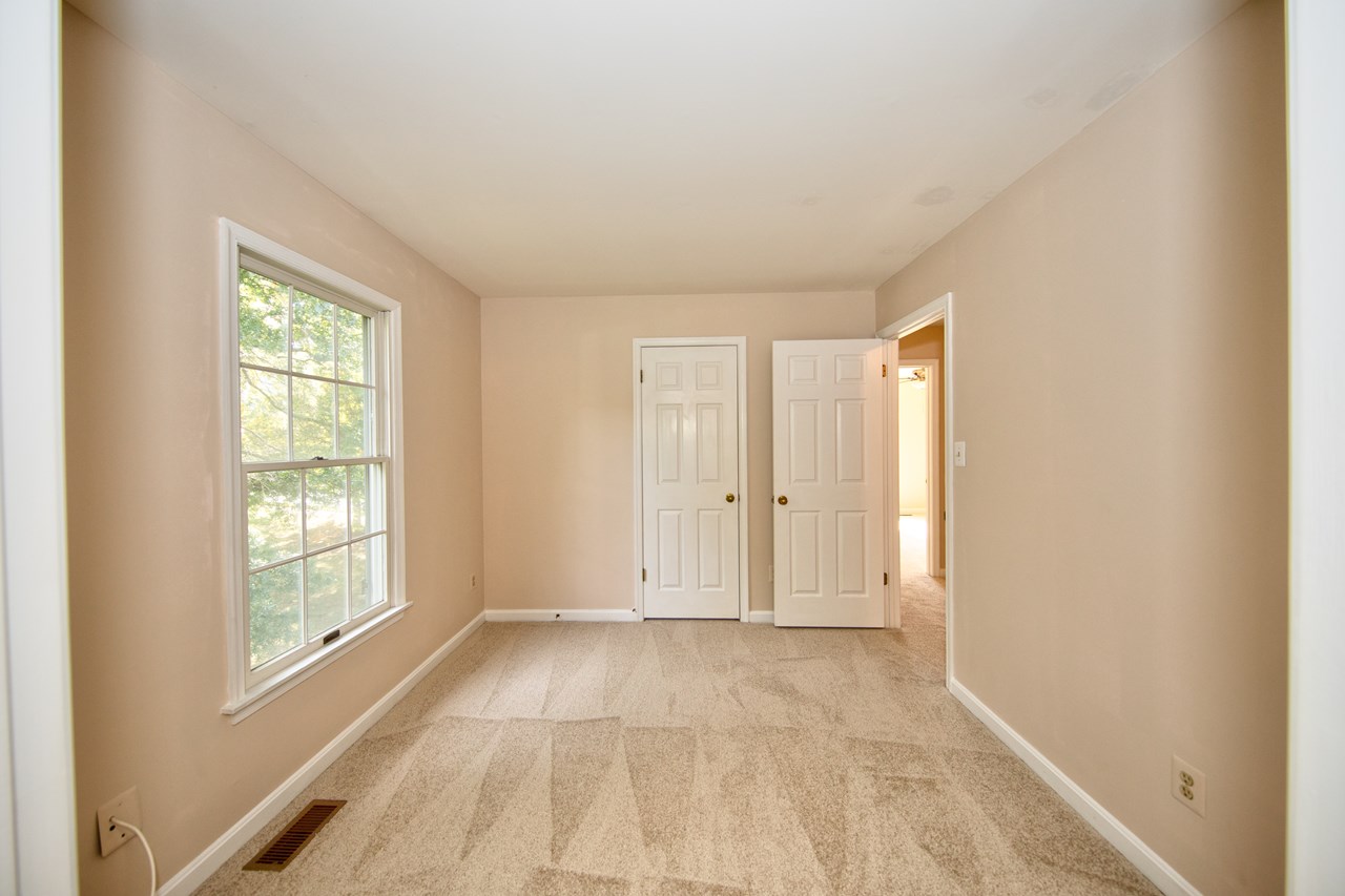 bedroom #2 with new carpet & paint