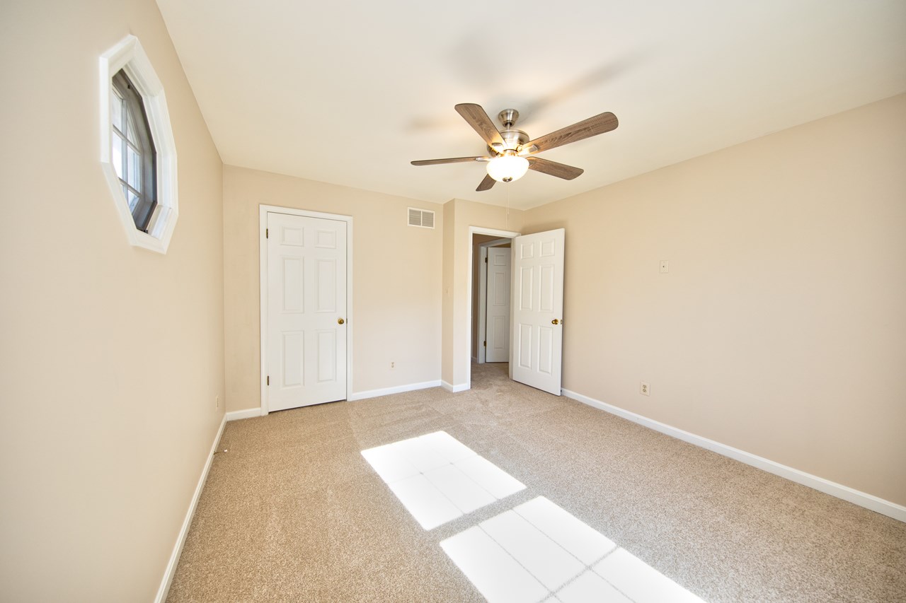 bedroom #4 with new carpet & paint