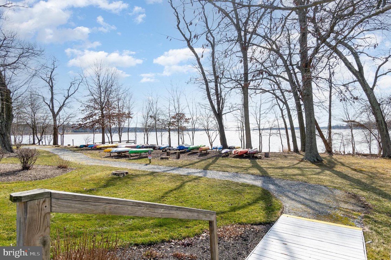 water's edge community with beach & kayak access