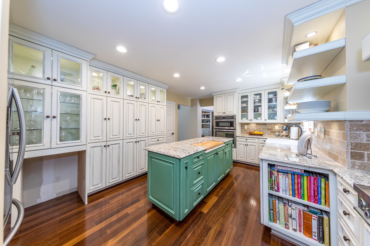 kitchen with an abundance of cabinets & shelves