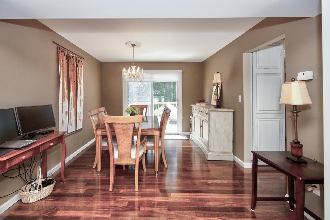 dining room with sliders to deck