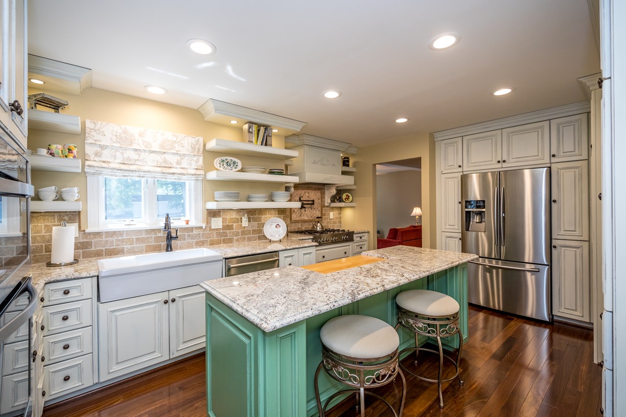 beautifully remodeled kitchen with granite countertops