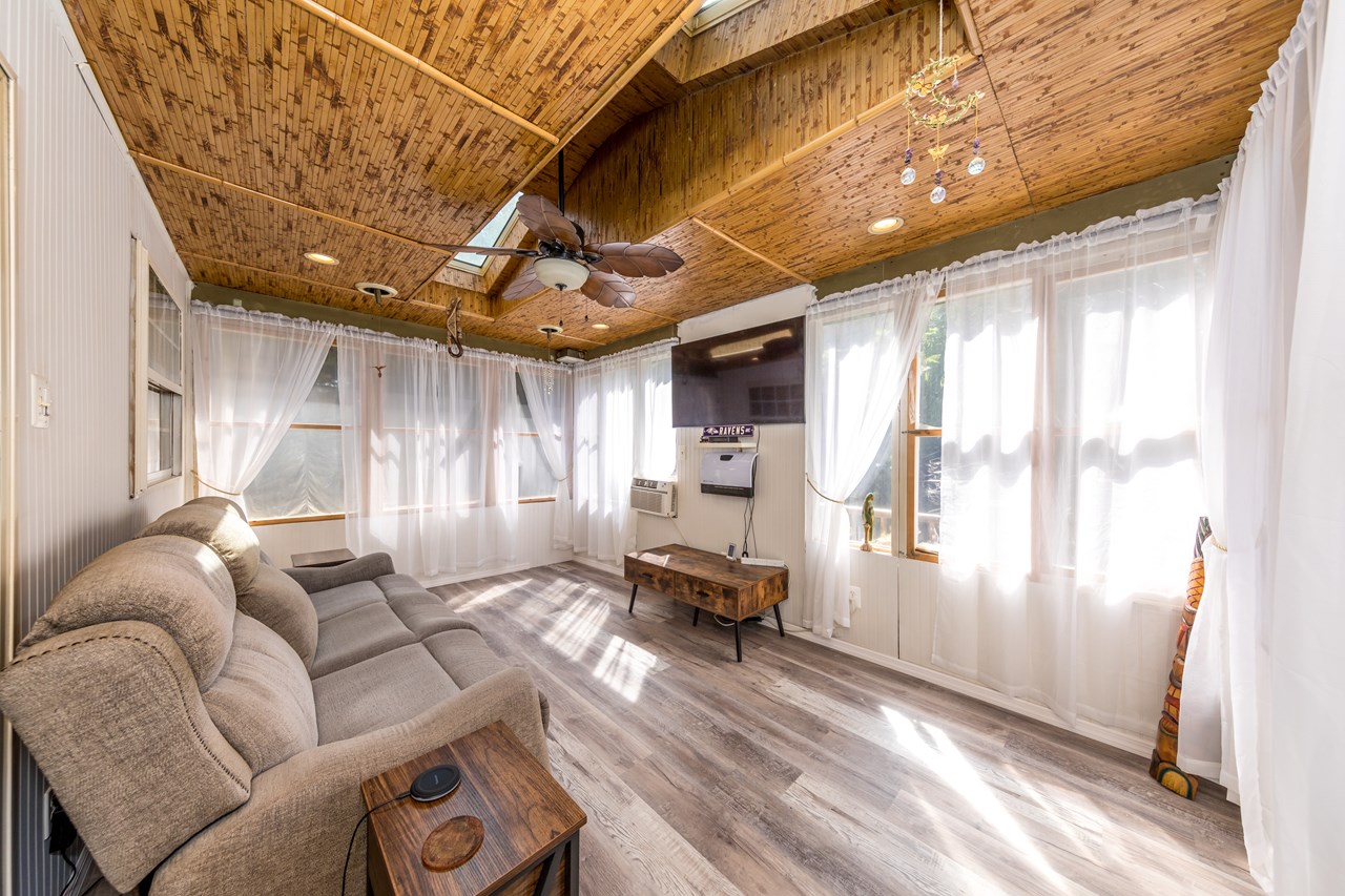 screened porch with skylights
