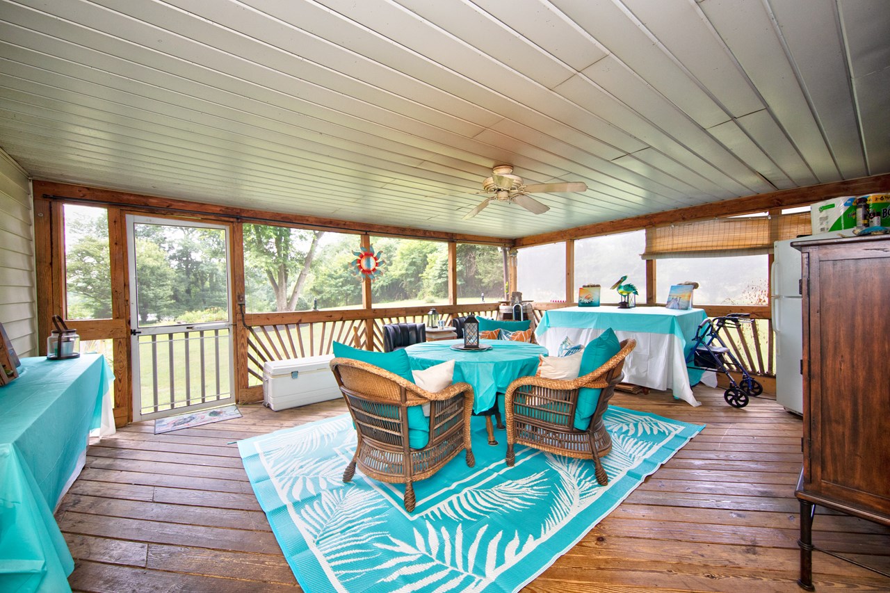screened sunporch ovelooking read yard