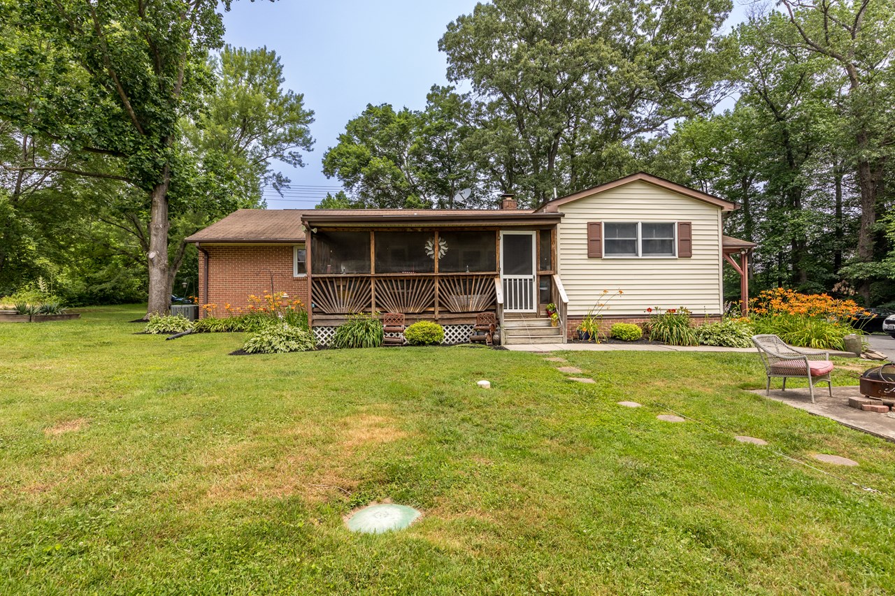 exterior  rear of home with sunporch
