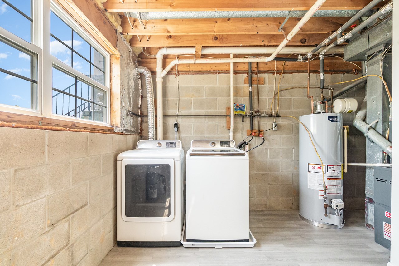 laundry room w/ new luxury vinyl flooring