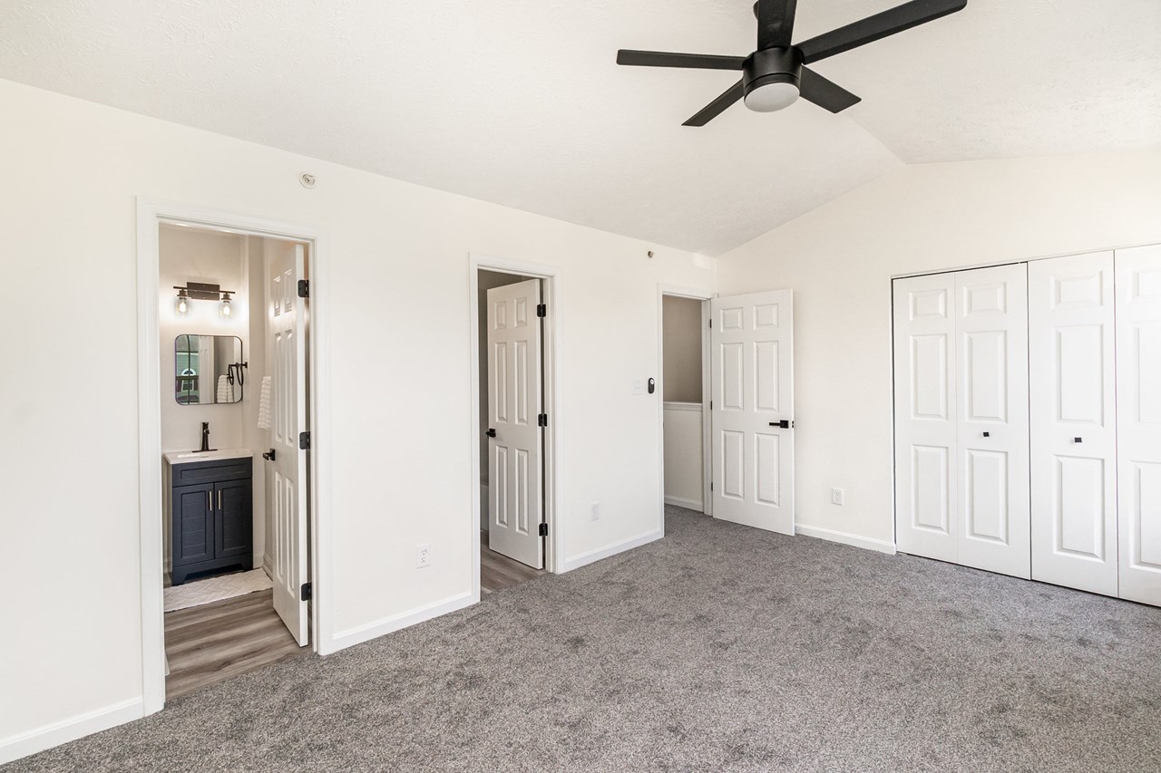 primary bedroom with bathroom access