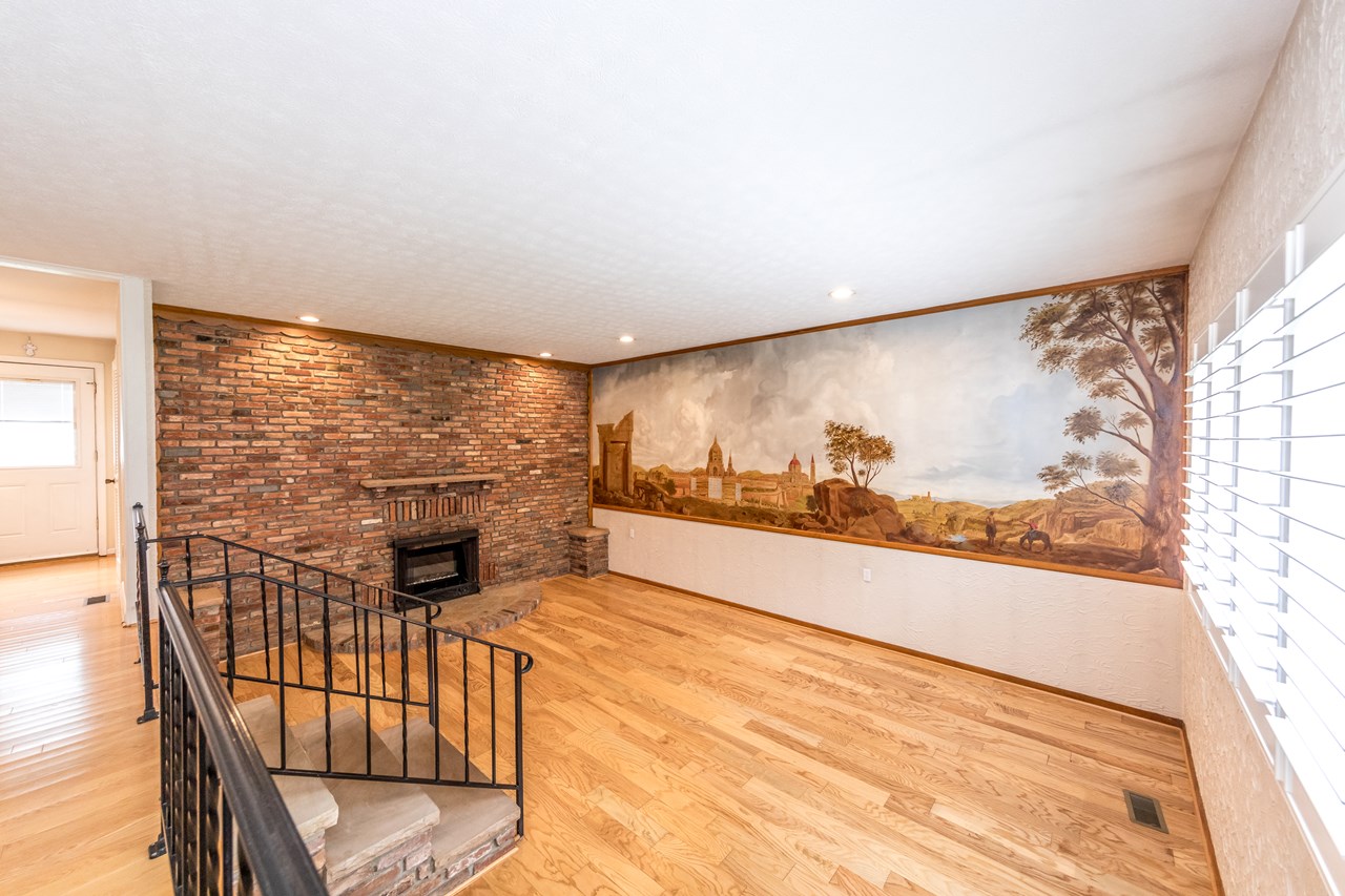 large living room w/ hardwood floors