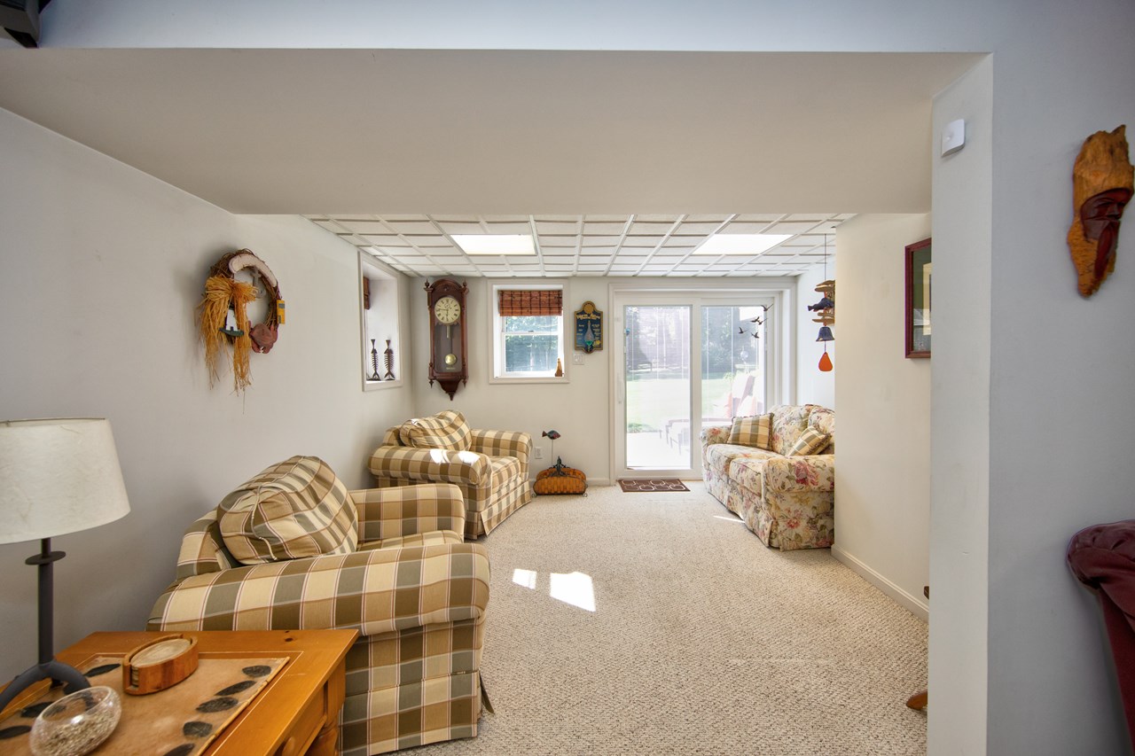 finished lower level with sliders to rear yard