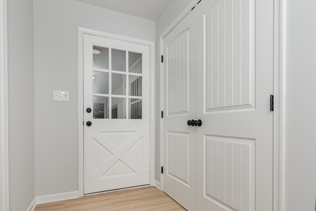 foyer/ entrance with large coat closet
