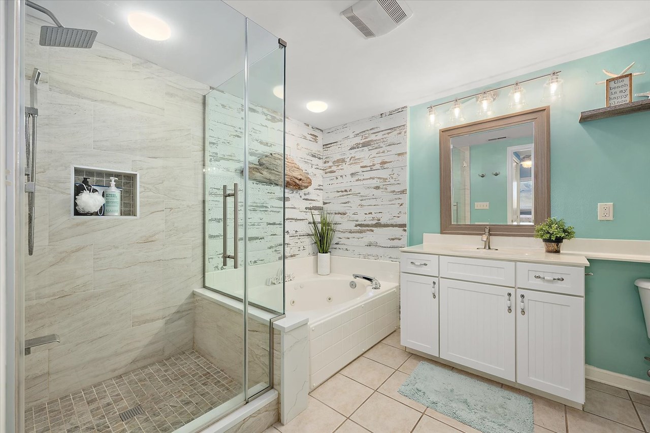 primary bathroom with soaking tub & shower