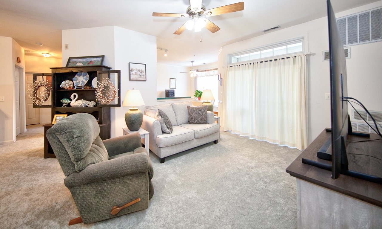 family room with sliders to balcony