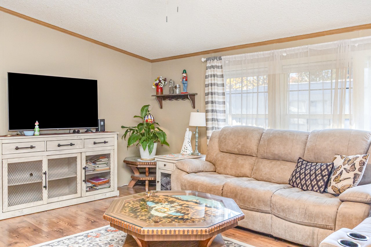 living room with vaulted ceilings