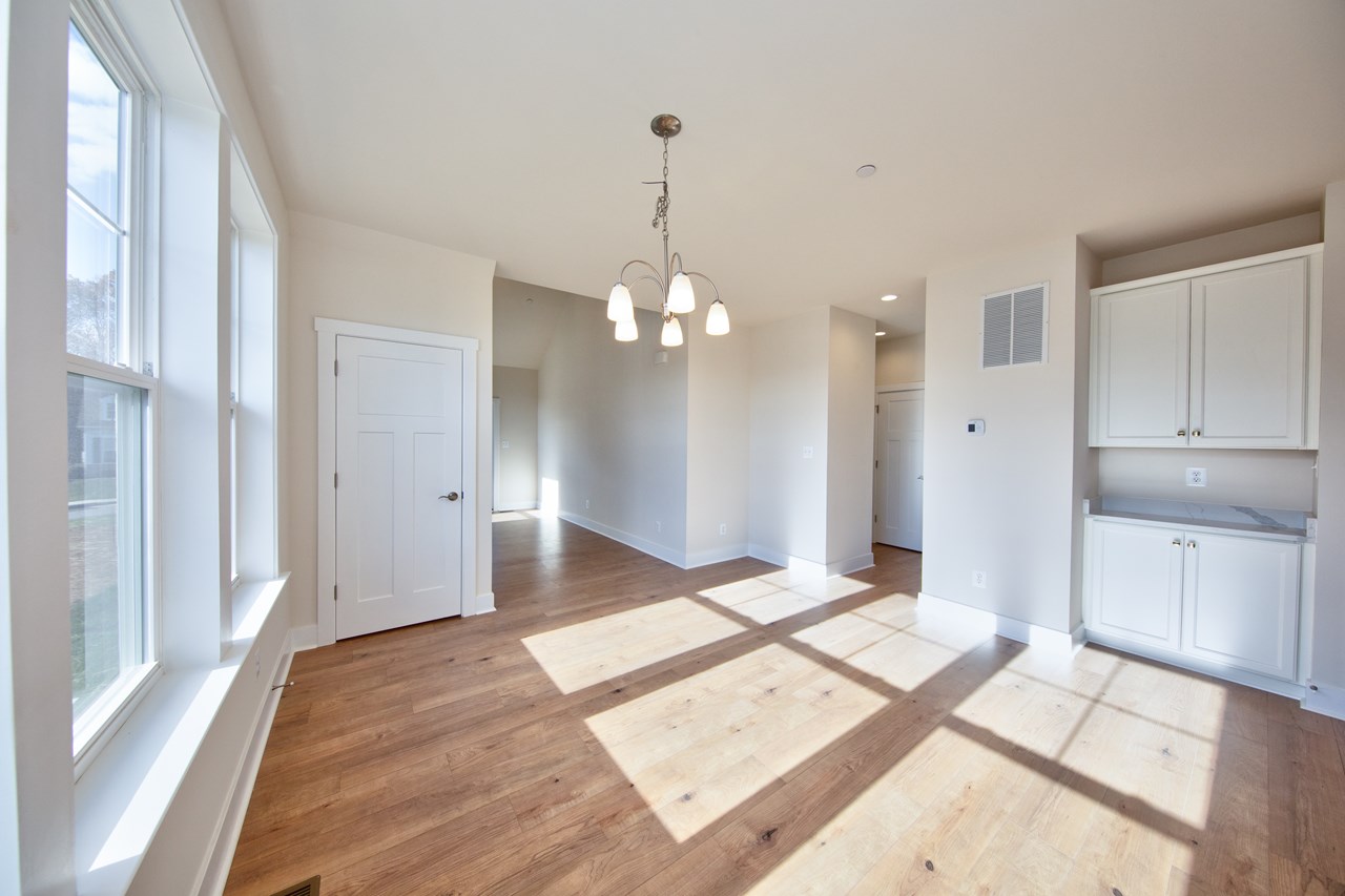 dining room with natural light & built in cabinets