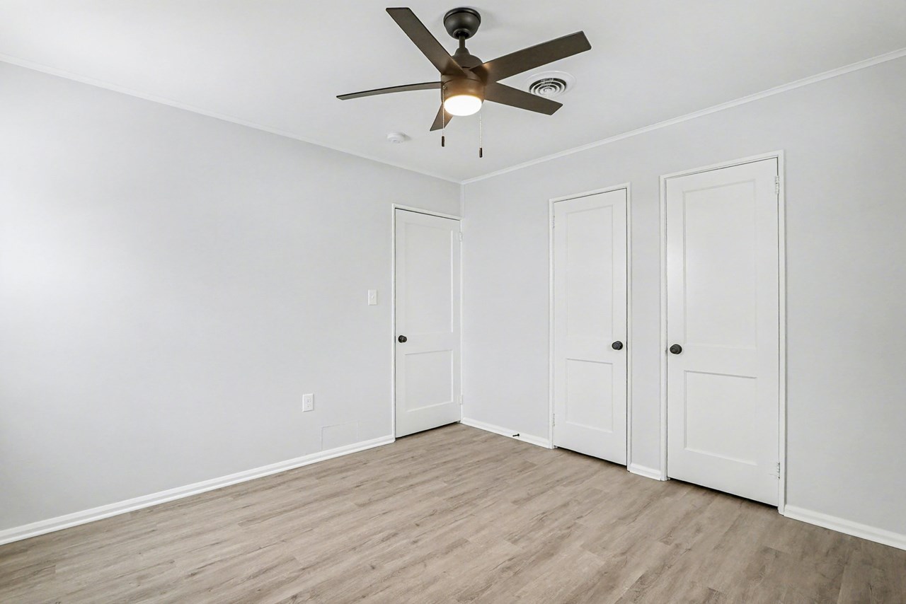 primary bedroom with additional closets