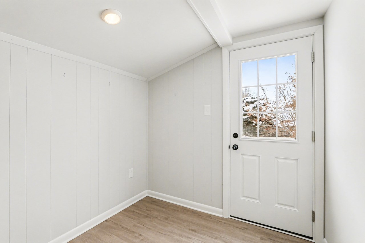 door leading to fenced rear yard