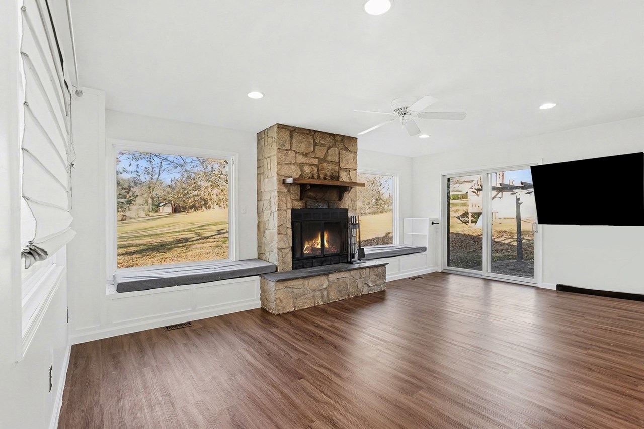 family room with wood burning fireplace