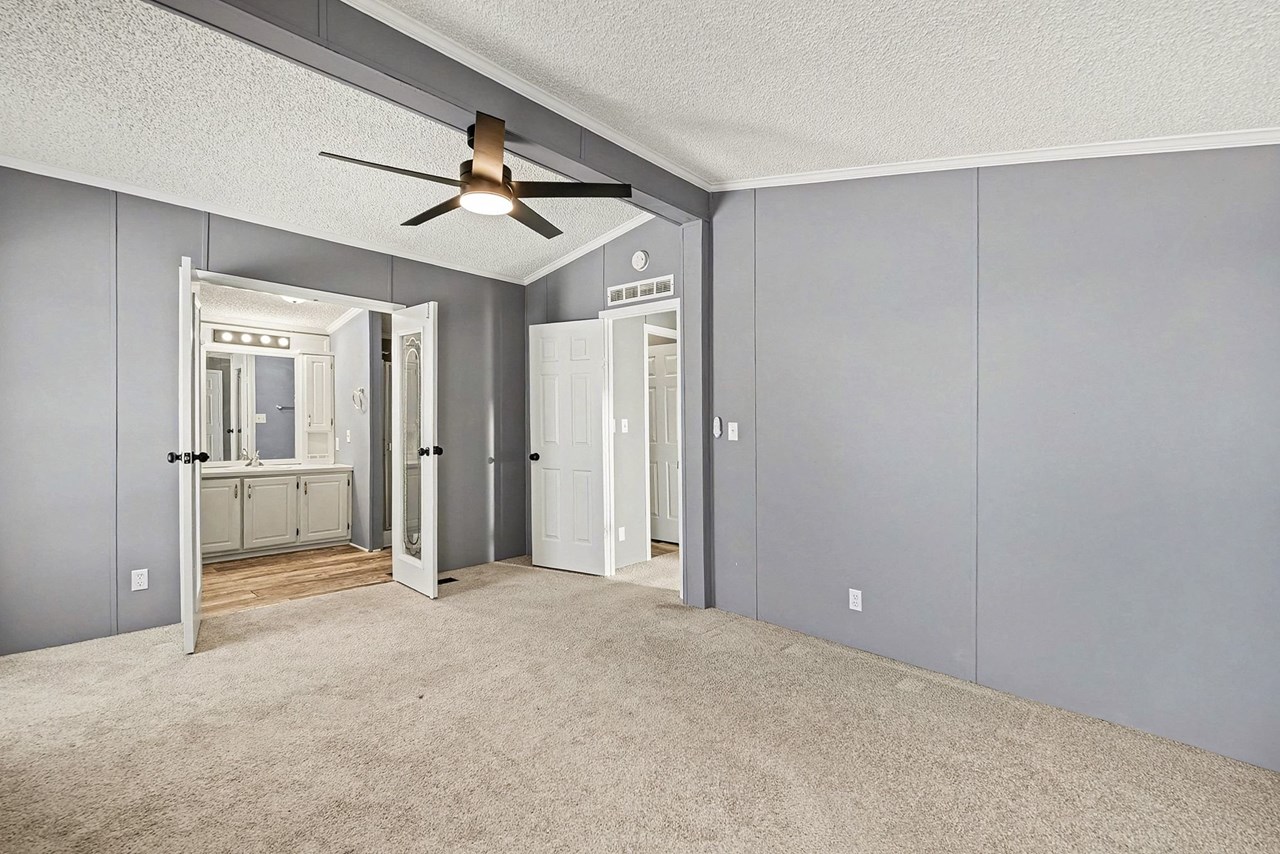 primary bedroom with full bath & 2 closets