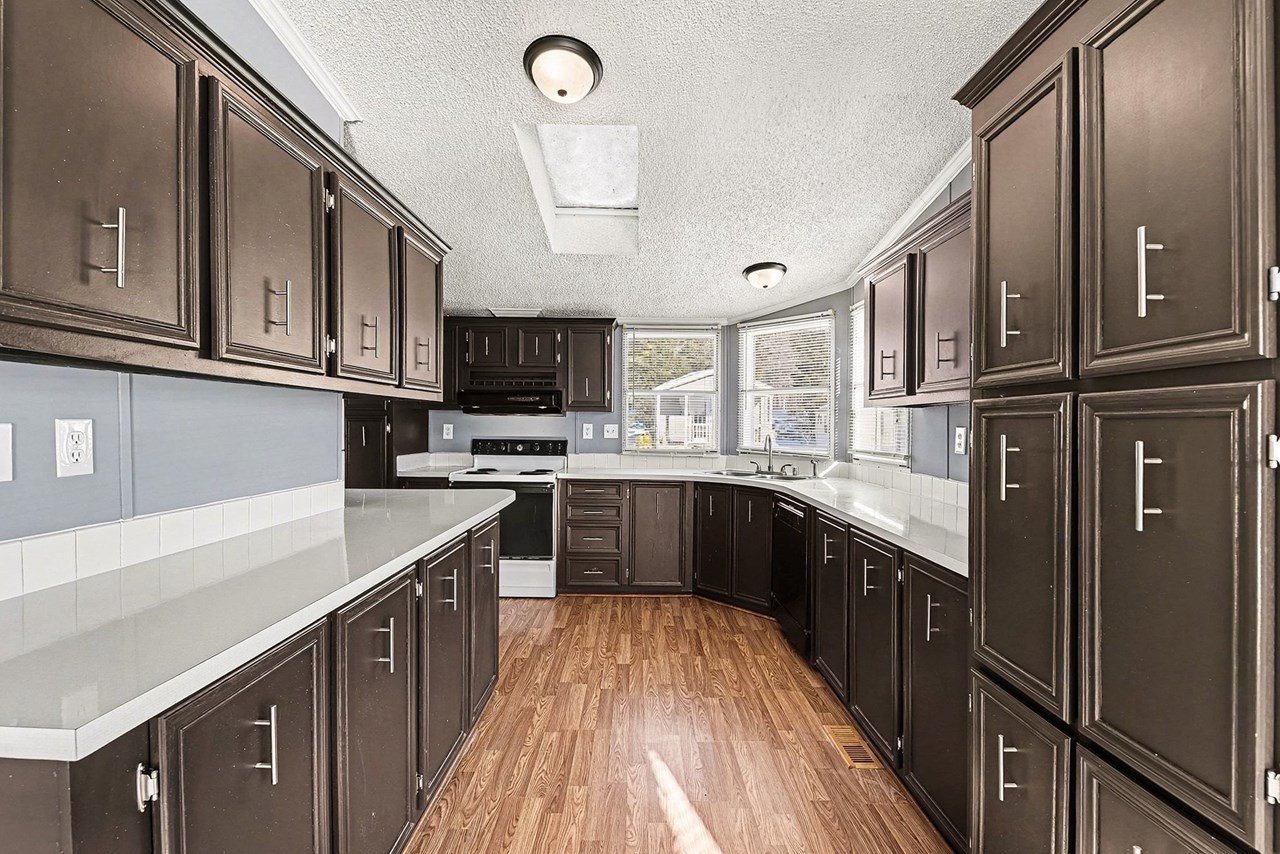large kitchen with plenty of cabinet & counter space