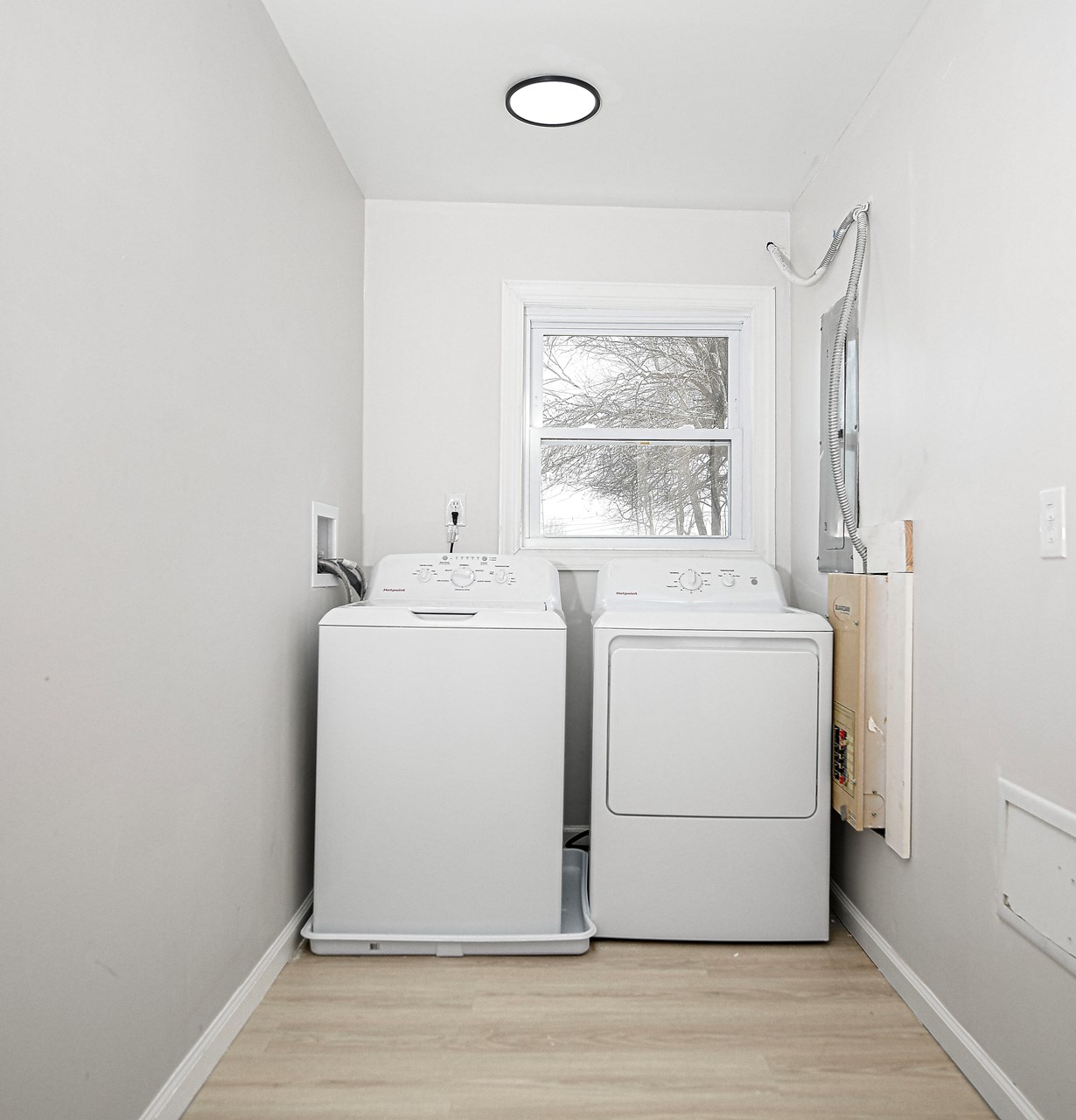 laundry room with new washer & dryer