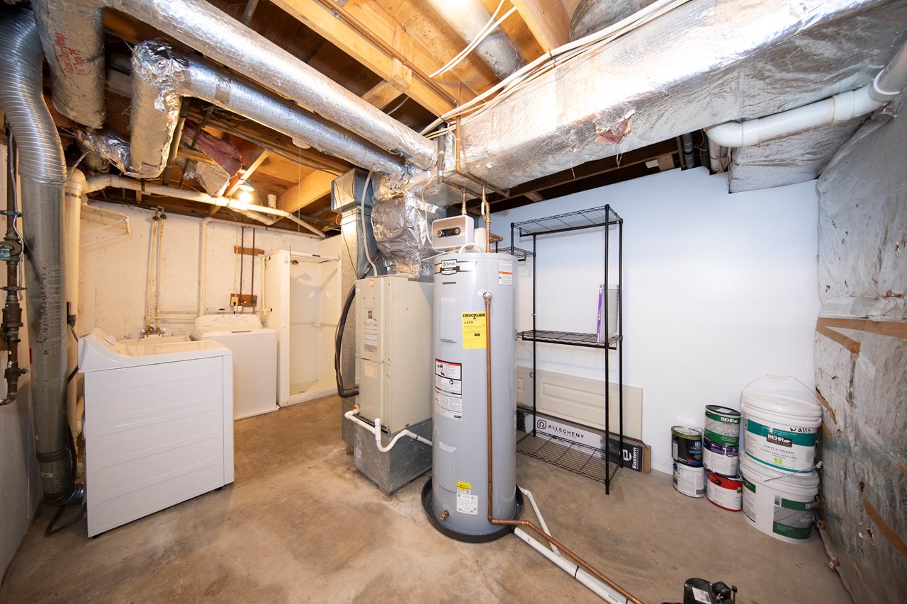 laundry area with additional shower