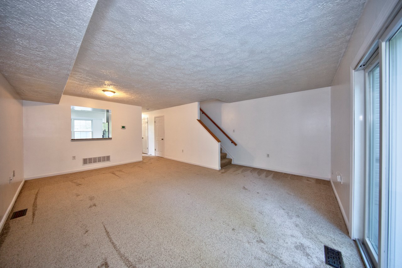 new carpet & fresh paint living room/ dining room combo