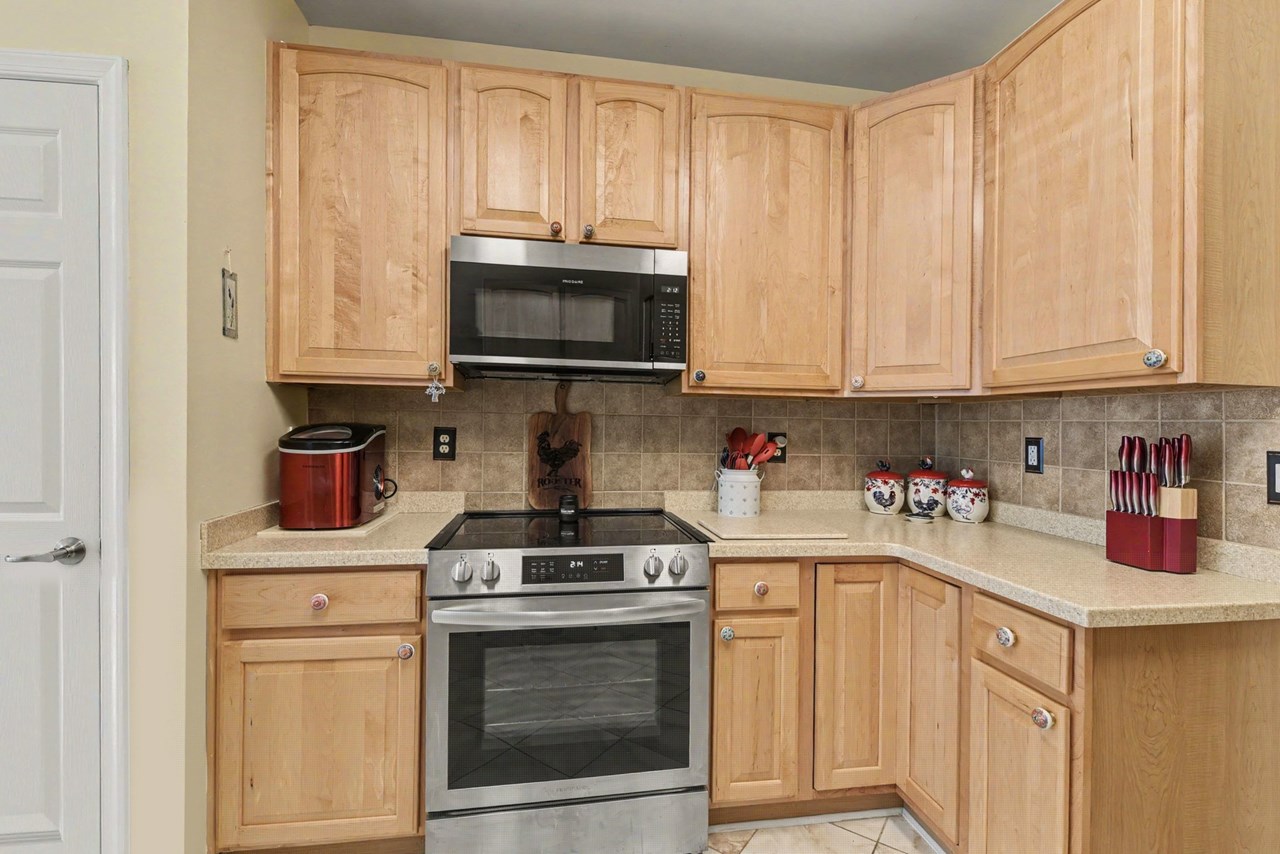 kitchen with corian countertops & pantry