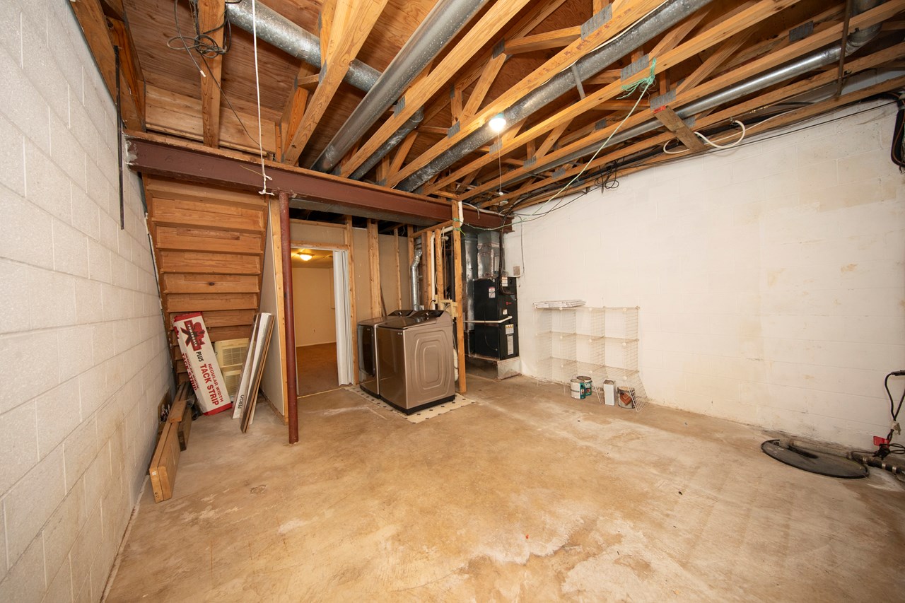 unfinished lower level with storage