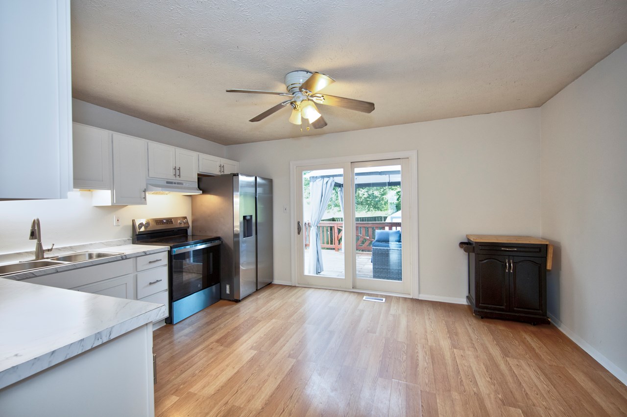 kitchen with new appliances & new slider to deck