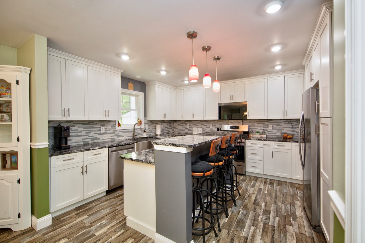 updated kitchen with ss appliances & granite countertops