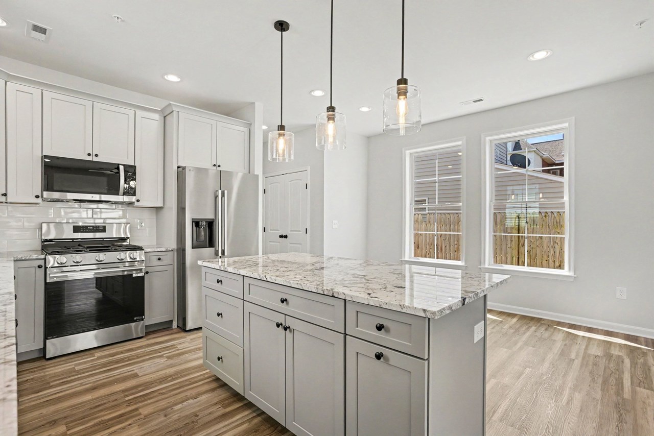 kitchen with granite counters & ss appliances