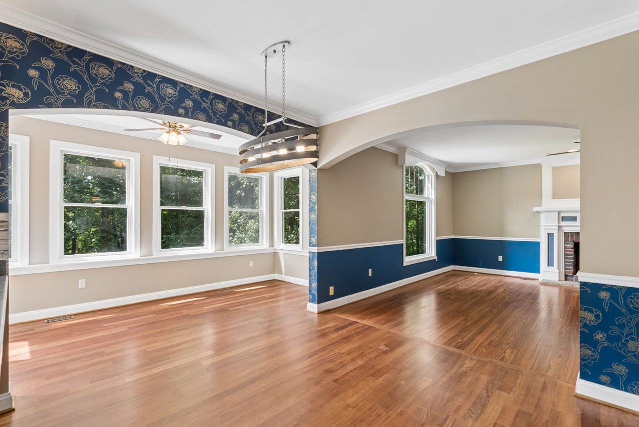 family room open to sunroom & kitchen