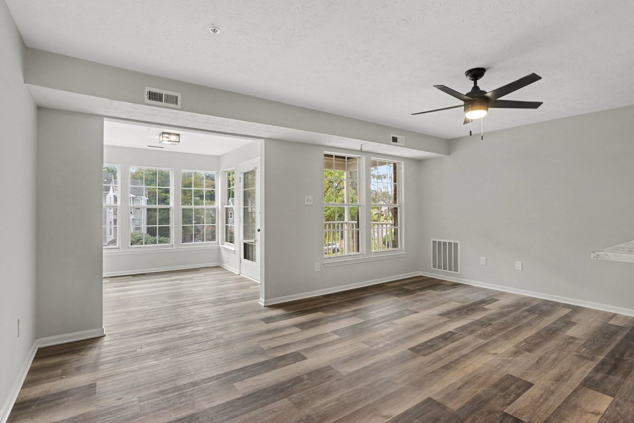family room with ceiling fan