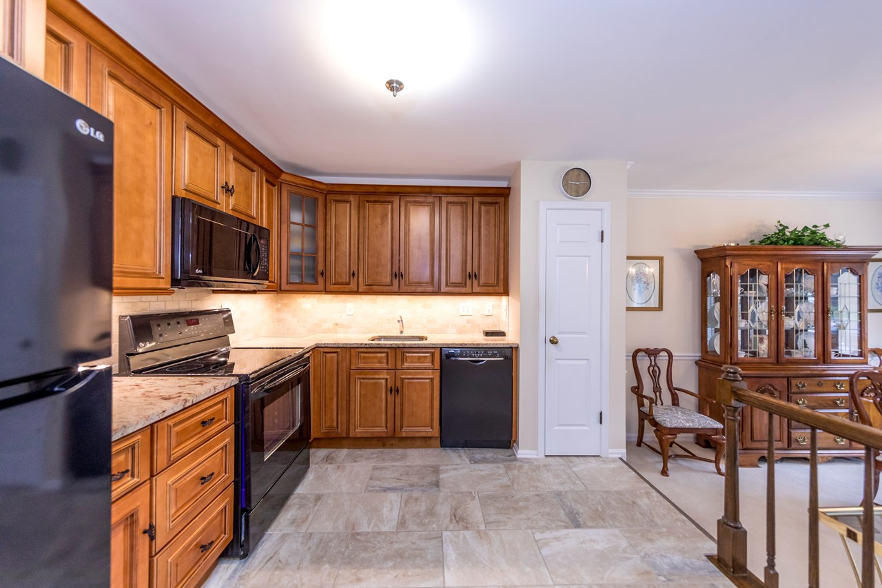 updated kitchen with granite countertops