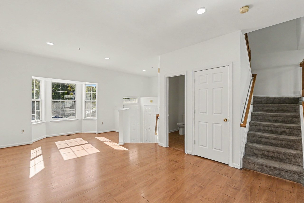 living room with bump out window